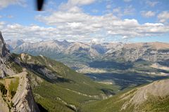 10 Canmore, Mount Peechee, Mount Charles Stewart, Mount Lady MacDonald, Grotto Mountain From Three Sisters Pass As Helicopter From Lake Magog Nears Canmore.jpg
